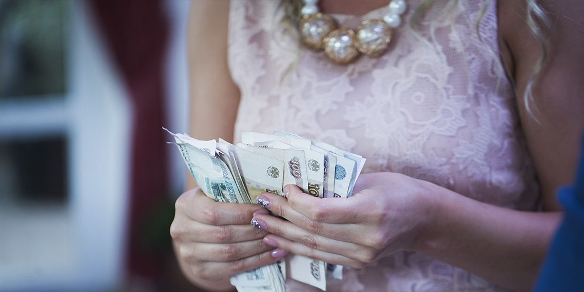 bride holding money