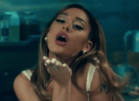 Ariana Grande Blowing Flour