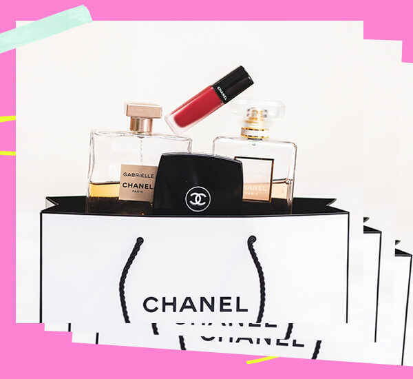 Chanel bag with chanel perfume, lipstick, compact spilling out