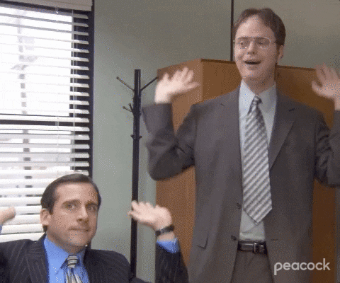 Dwight and Michael from The Office raising the roof
