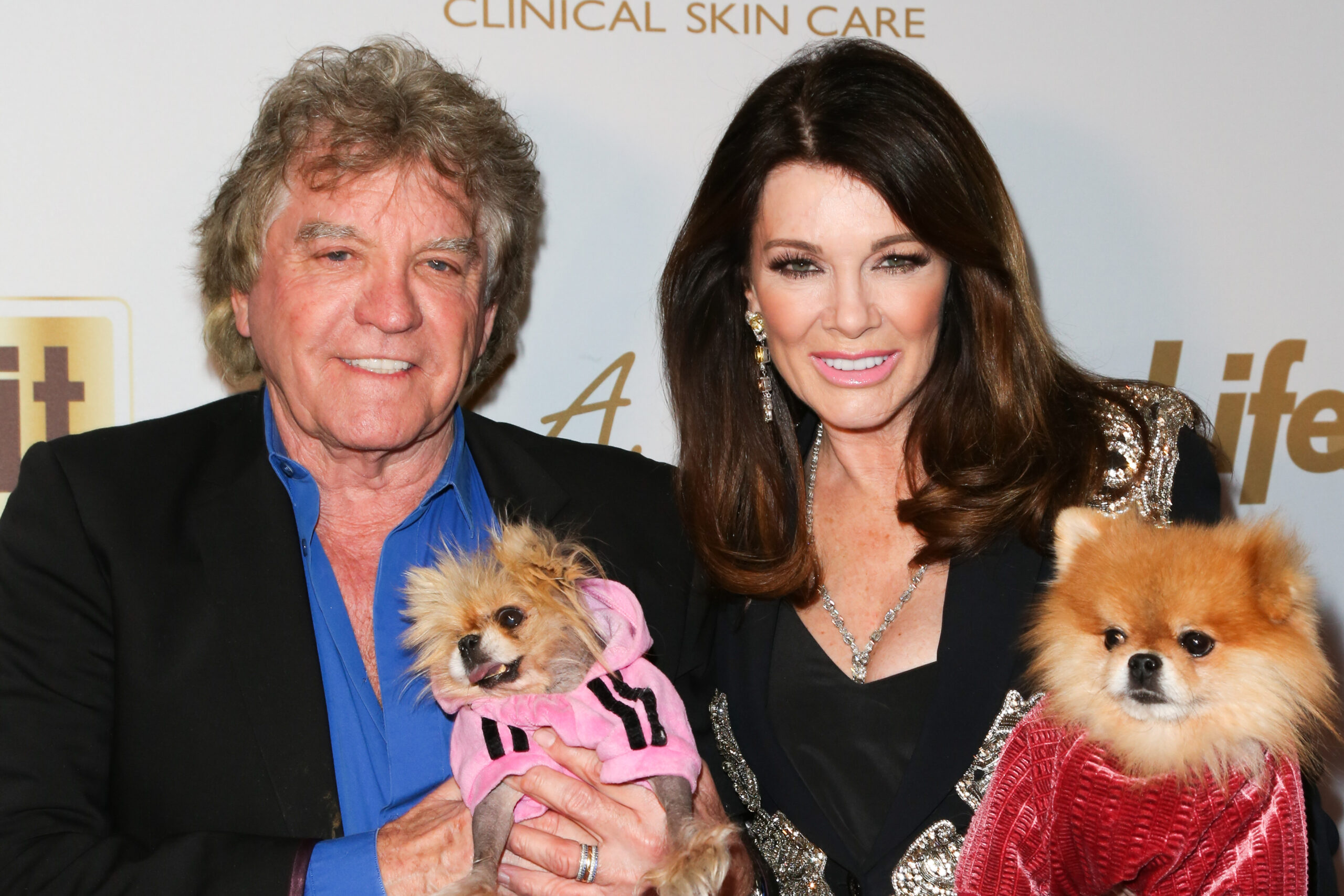 Ken Todd and Lisa Vanderpump walk the 2019 Grammy's red carpet with dogs Giggy and Harrison.