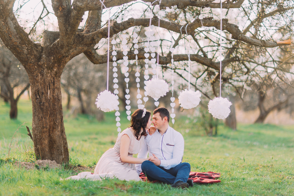 Engagement,Photo,Session,Of,Beatiful,Couple,In,Love,Sitting,On