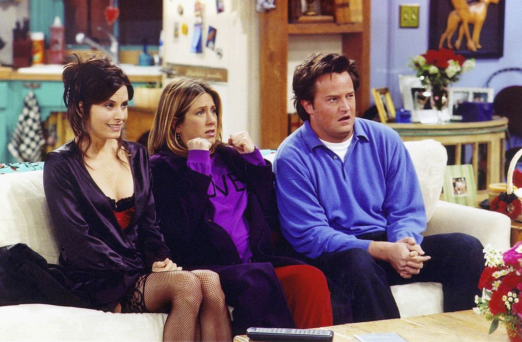 FRIENDS -- "The One With The Birthing Video"-- Episode 15 -- Aired 2/7/2002 -- Pictured: (l-r) Courteney Cox as Monica Geller-Bing, Jennifer Aniston as Rachel Green, Matthew Perry as Chandler Bing -- Photo by: Danny Feld/NBCU Photo Bank