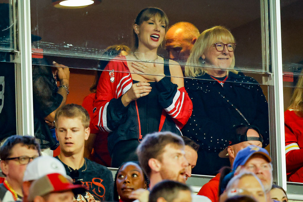 KANSAS CITY, MISSOURI - OCTOBER 12: Taylor Swift and Donna Kelce react before the game between the Kansas City Chiefs and the Denver Broncos at GEHA Field at Arrowhead Stadium on October 12, 2023 in Kansas City, Missouri. (Photo by David Eulitt/Getty Images)