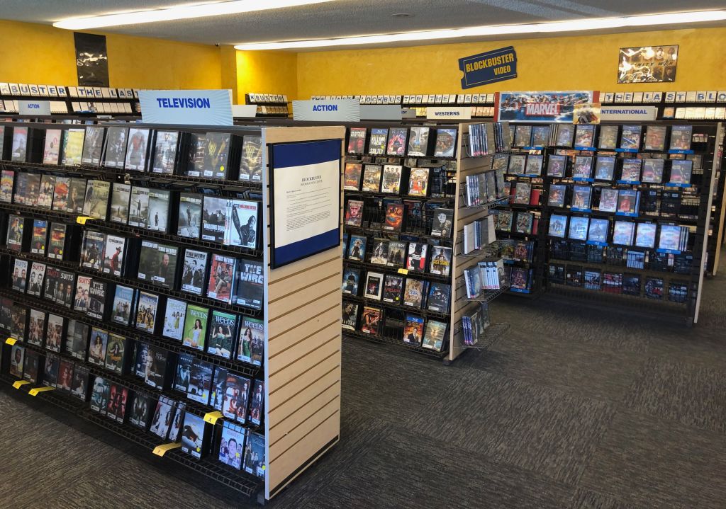 This photo taken on July 26, 2020 shows the interior of the last remaining Blockbuster store, in Bend, Oregon. - Is 2020 proving a bit too much? The last Blockbuster store on the planet is offering guests a chance to roll back the clock to simpler times with a '90s themed sleepover, it was announced on August 11, 2020. An Airbnb listing for the holdout video rental shop in the northwestern US state of Oregon promises to convert the store into a makeshift living room "with a pull-out couch, bean bags and pillows for you to cozy up with 'new releases' from the '90s." (Photo by Andrew MARSZAL / AFP) (Photo by ANDREW MARSZAL/AFP via Getty Images)