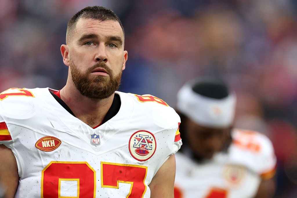 FOXBOROUGH, MASSACHUSETTS - DECEMBER 17: Travis Kelce #87 of the Kansas City Chiefs looks on without his helmet on the way to the locker room during halftime against the New England Patriots at Gillette Stadium on December 17, 2023 in Foxborough, Massachusetts. (Photo by Maddie Meyer/Getty Images)