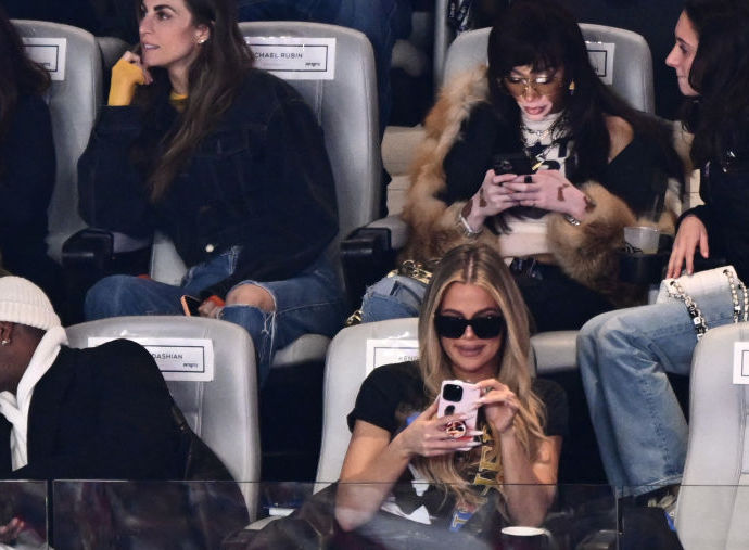 US actress La La Anthony (L), US media personality Khloe Kardashian (R) and Canadian model Winnie Harlow (top, 2nd R) attend Super Bowl LVIII between the Kansas City Chiefs and the San Francisco 49ers at Allegiant Stadium in Las Vegas, Nevada, February 11, 2024. (Photo by Patrick T. Fallon / AFP)