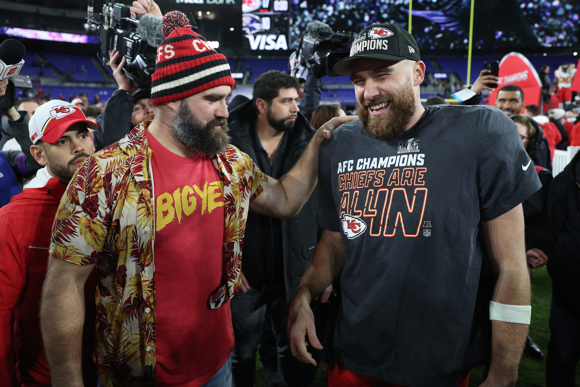 Travis Kelce #87 of the Kansas City Chiefs celebrates with his brother Jason Kelce