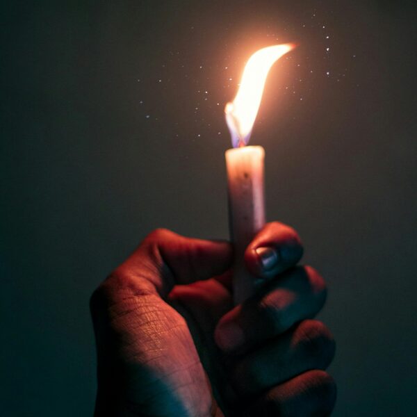 person holding candle