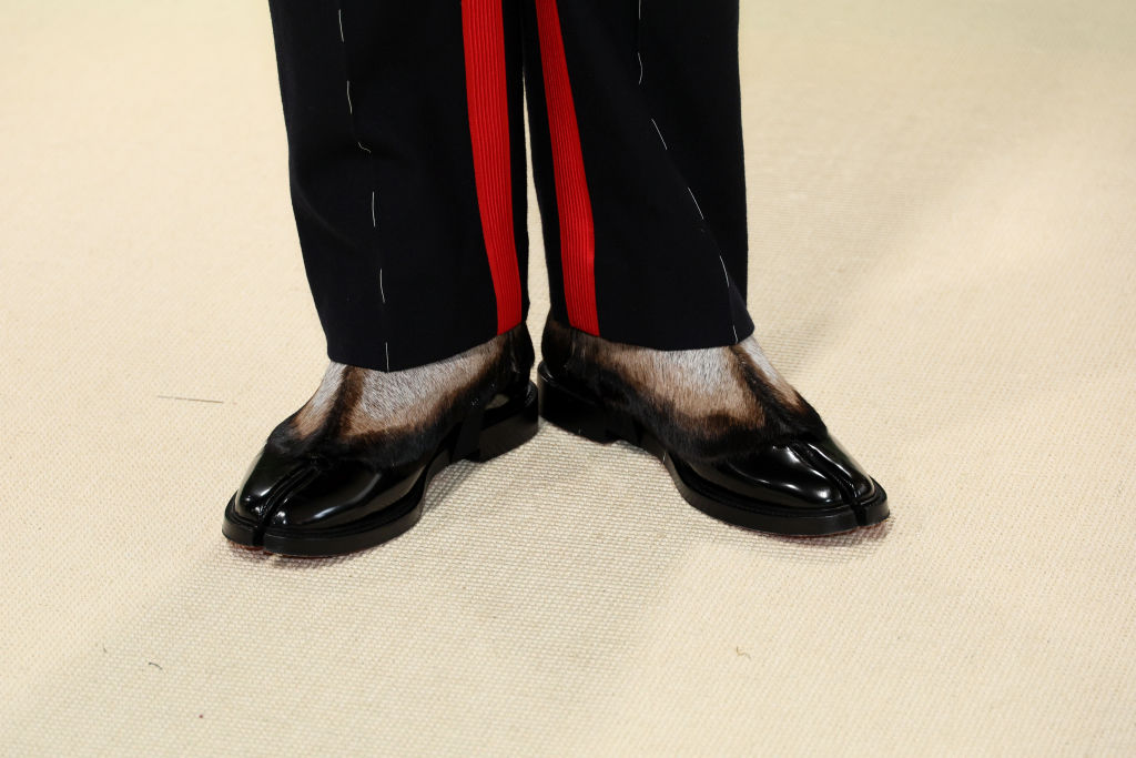 NEW YORK, NEW YORK - MAY 06: Bad Bunny, shoes and fashion detail, attends The 2024 Met Gala Celebrating "Sleeping Beauties: Reawakening Fashion" at The Metropolitan Museum of Art on May 06, 2024 in New York City. (Photo by Dia Dipasupil/Getty Images)