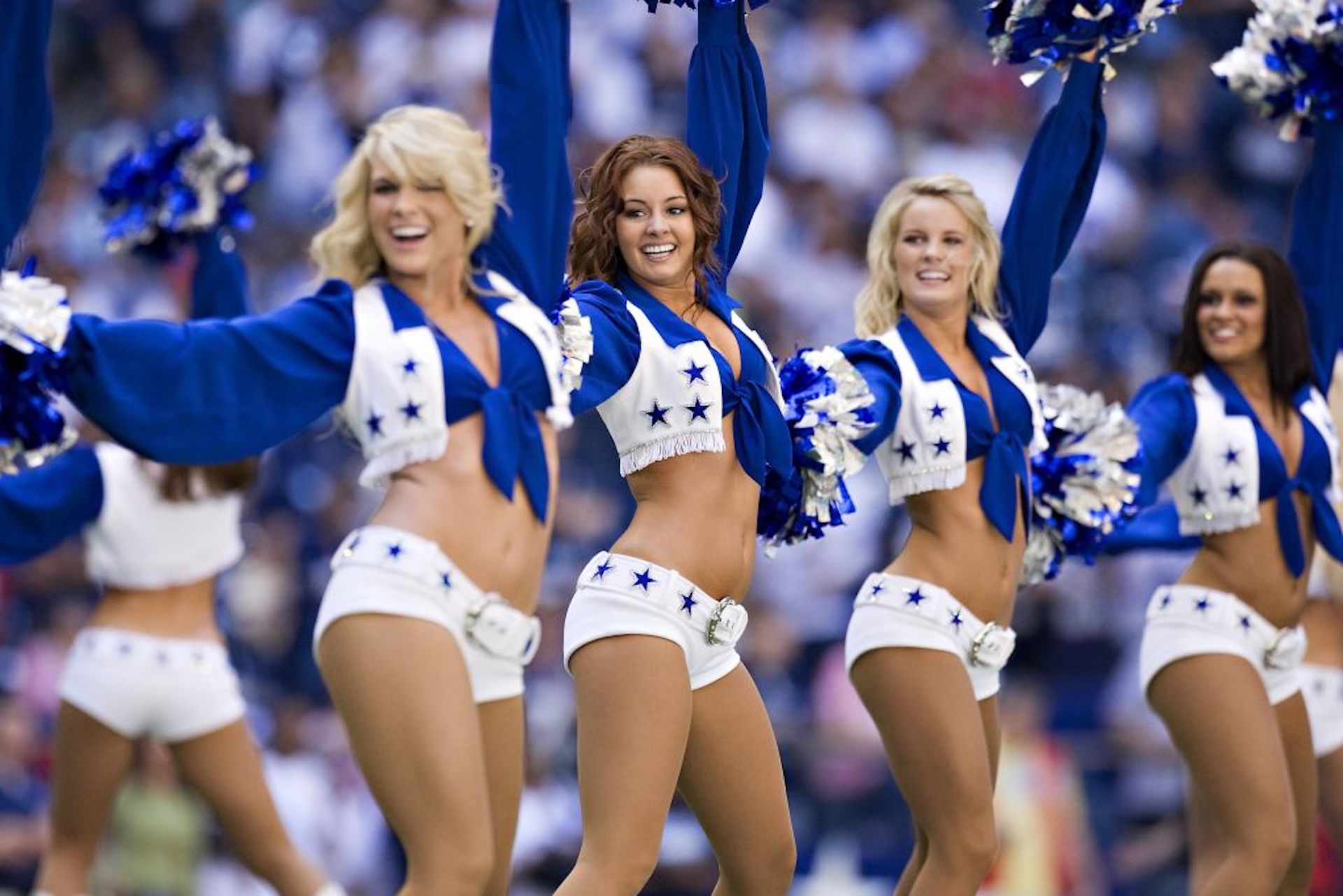 IRVING, TX - OCTOBER 26: Dallas Cowboys cheerleaders perform during the game against the Tampa Bay Buccaneers at Texas Stadium on October 26, 2008 in Irving, Texas. The Cowboys defeated the Buccaneers 13-9. (Photo by Wesley Hitt/Getty Images)