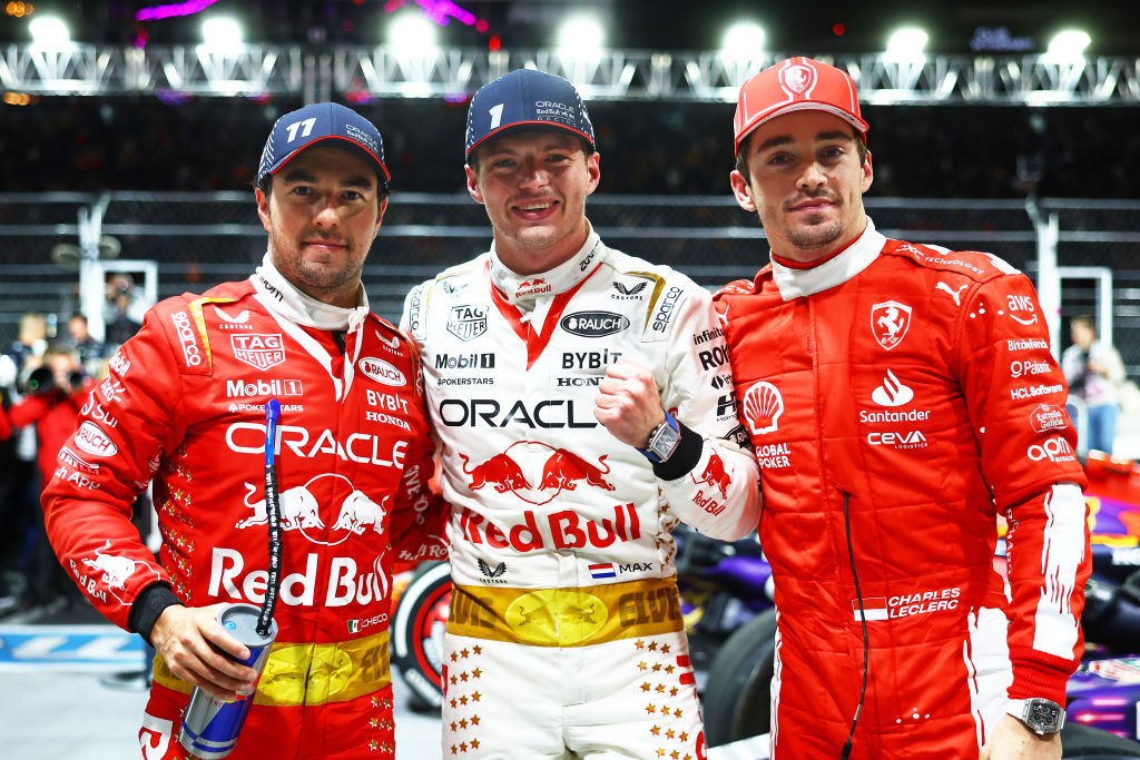 LAS VEGAS, NEVADA - NOVEMBER 18: Race winner Max Verstappen of the Netherlands and Oracle Red Bull Racing, Second placed Charles Leclerc of Monaco and Ferrari and Third placed Sergio Perez of Mexico and Oracle Red Bull Racing pose for a photo in parc ferme during the F1 Grand Prix of Las Vegas at Las Vegas Strip Circuit on November 18, 2023 in Las Vegas, Nevada. (Photo by Mark Thompson/Getty Images)