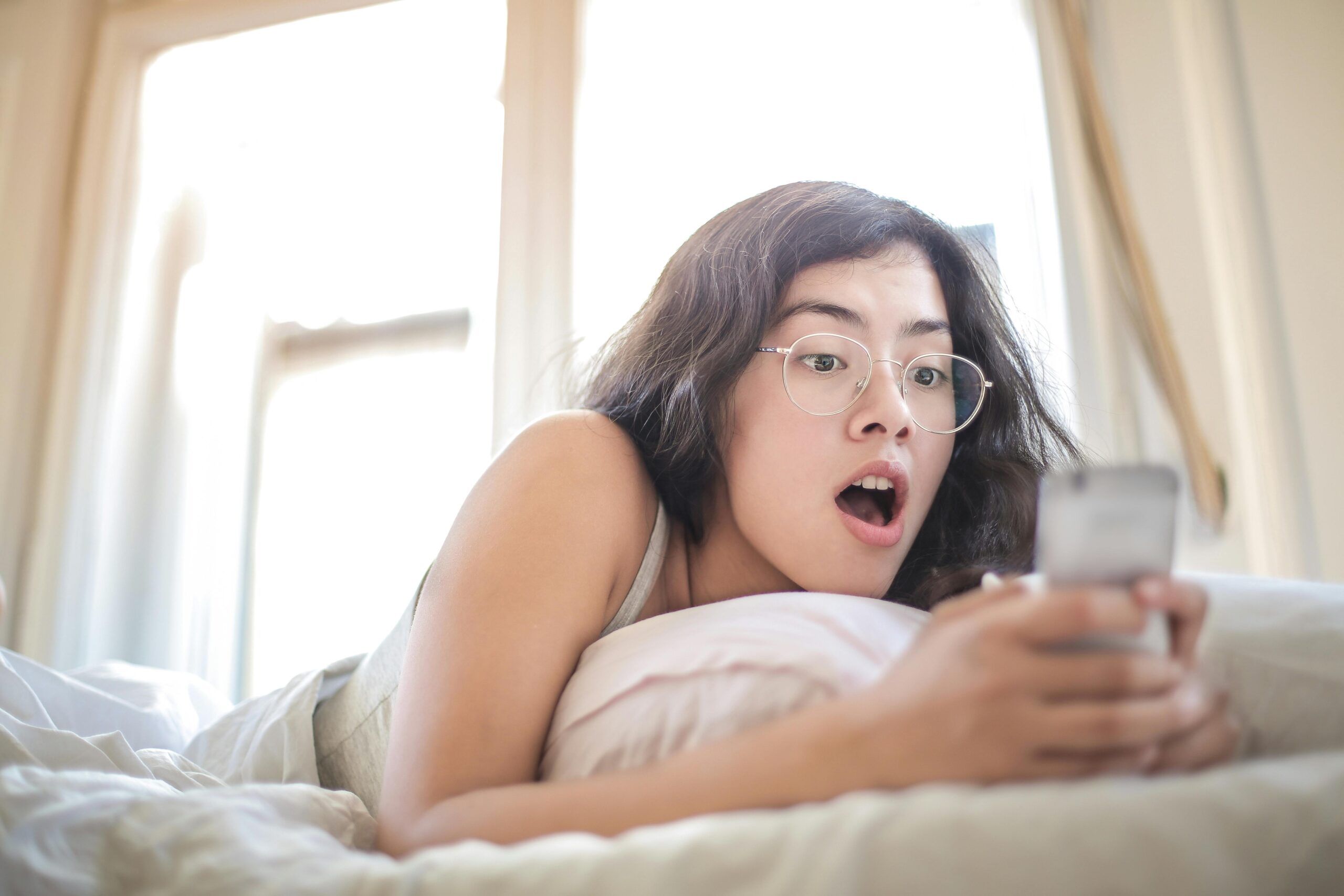 woman shocked at phone