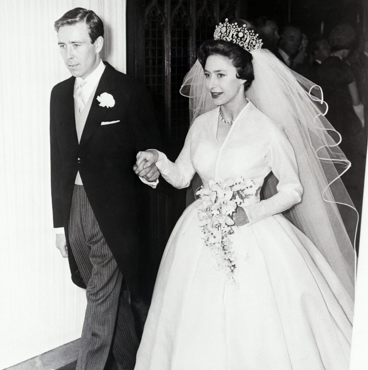 Princess Margaret and her new husband Antony Armstrong-Jones leave Westminister Abbey after their wedding.